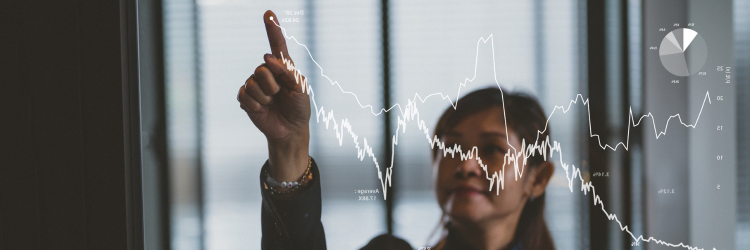 Woman looking at financial chart