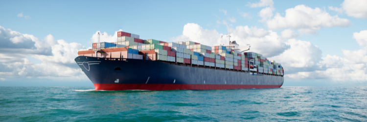 Cargo ship with crates on the ocean